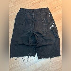 Custom widened black distressed Jean shorts made by my friend @huntz_44